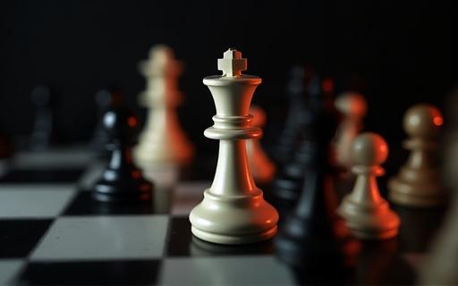 Chess pieces on a board, symbolizing strategic HR planning.